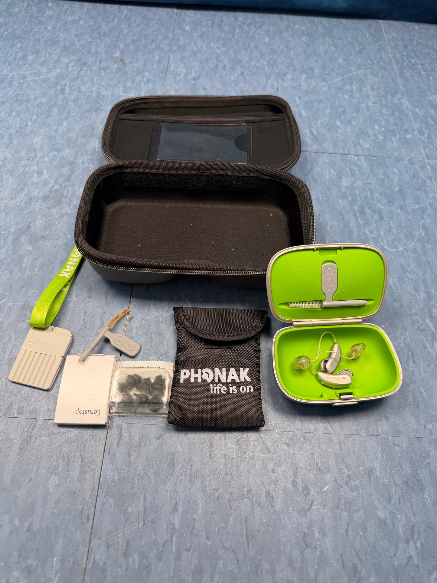 Pair of Phonak Hearing with Case and Extras