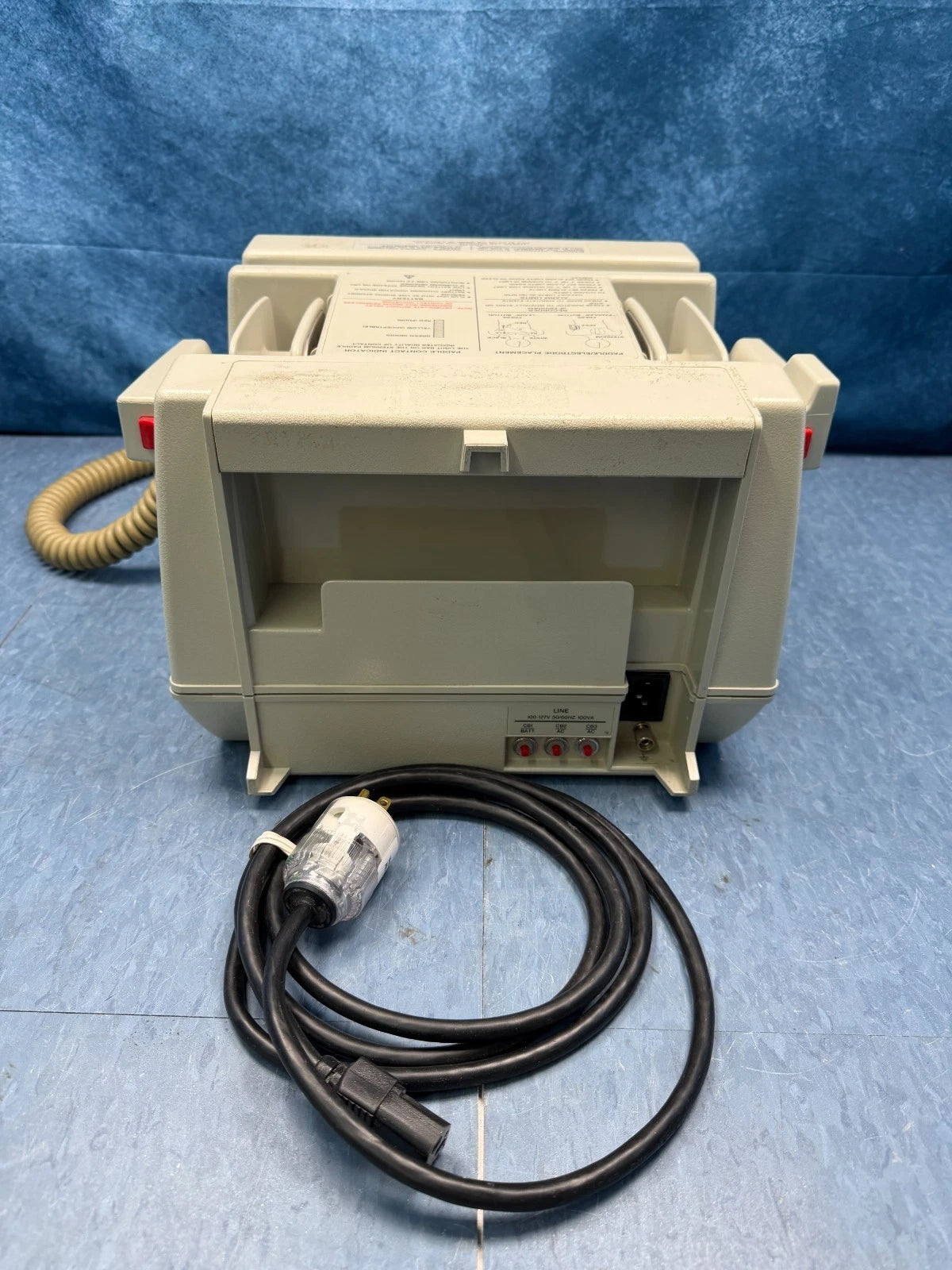 HP Hewlett Packard Ref. 43100A Defibrillator with Hard Paddles, Power Cord and New EKG Cable